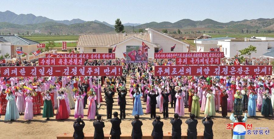 Ceremonies of Moving into New Houses Held at Farm Villages in DPRK