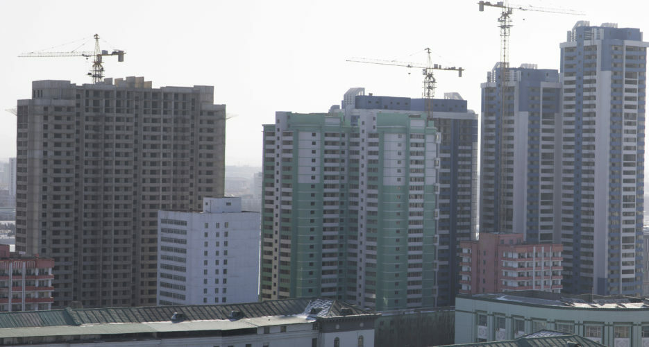Towerblock construction surrounding Kim Il Sung square slows, photos show