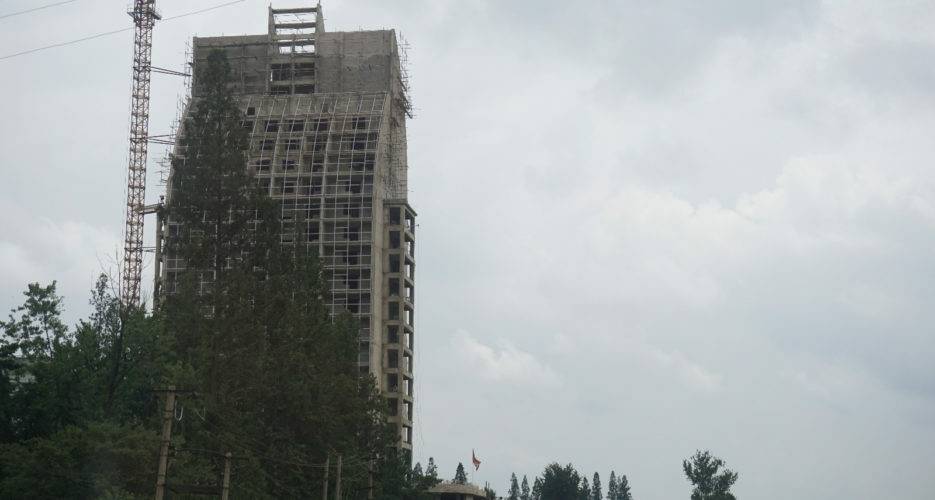Construction on new sail-shaped tower in central Pyongyang underway: photos