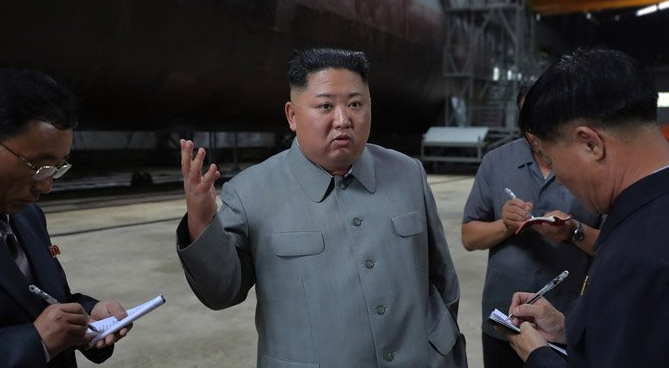 Why Kim’s submarine visit leaves room for talks, but reflects hardening position