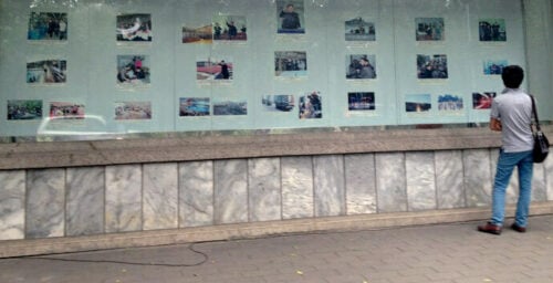 Kim Jong Un pictures dominate display outside Beijing embassy