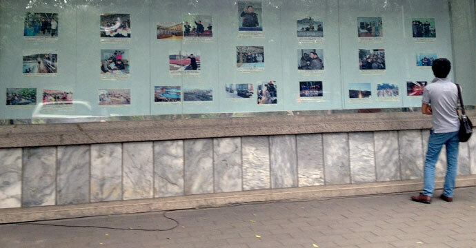 Kim Jong Un pictures dominate display outside Beijing embassy