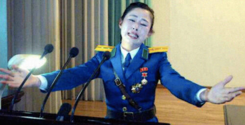 Pyongyang traffic girl given mystery hero award