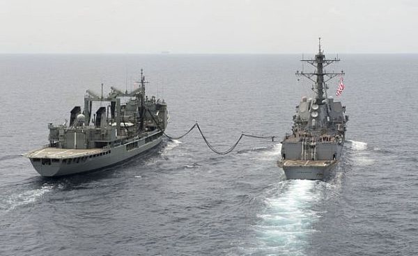 The guided-missile destroyer USS Spruance (DDG 111, Right) takes on a fuel line from the Australian oiler HMAS Success (OR 304) during a refueling at South China sea. (July 27, 2016)  I Credit: U.S. Navy photo