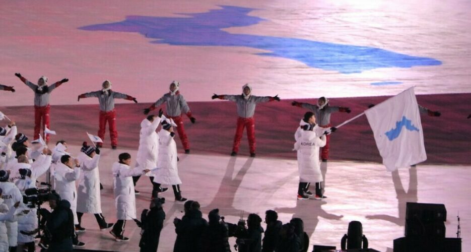 Two Koreas march under unification flag at Winter Olympics Opening Ceremony