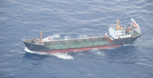 Japan releases new images of North Korea sanctions breach at sea