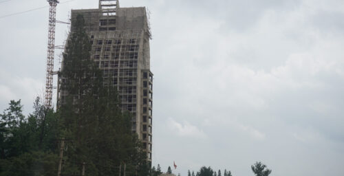 Construction on new sail-shaped tower in central Pyongyang speeds up: photos