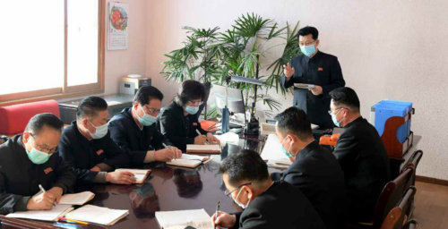 Mask-clad North Korean Premier visits coronavirus quarantine workers
