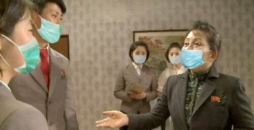 North Korean media turns to photoshop in bid to promote face mask use