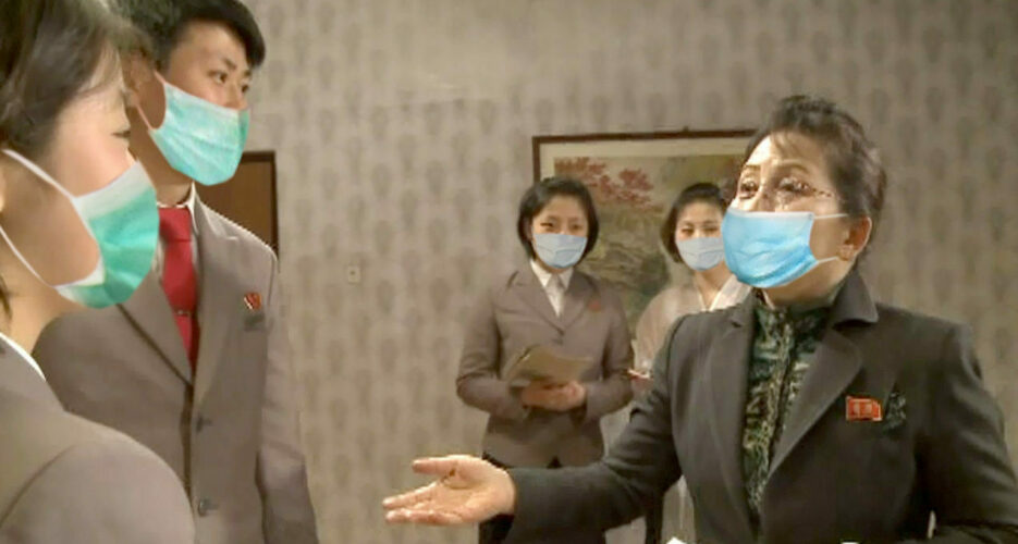 North Korean media turns to photoshop in bid to promote face mask use