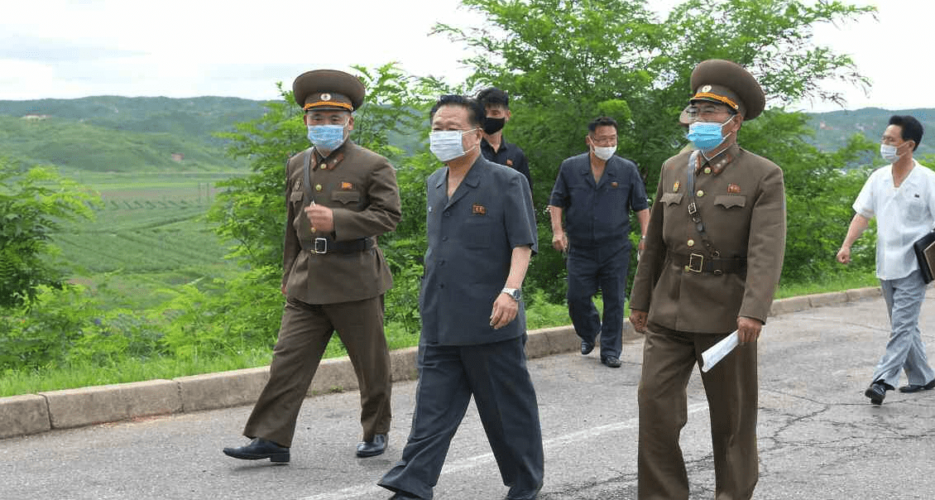 North Korea claims zero COVID-19 cases as top official visits city on lockdown