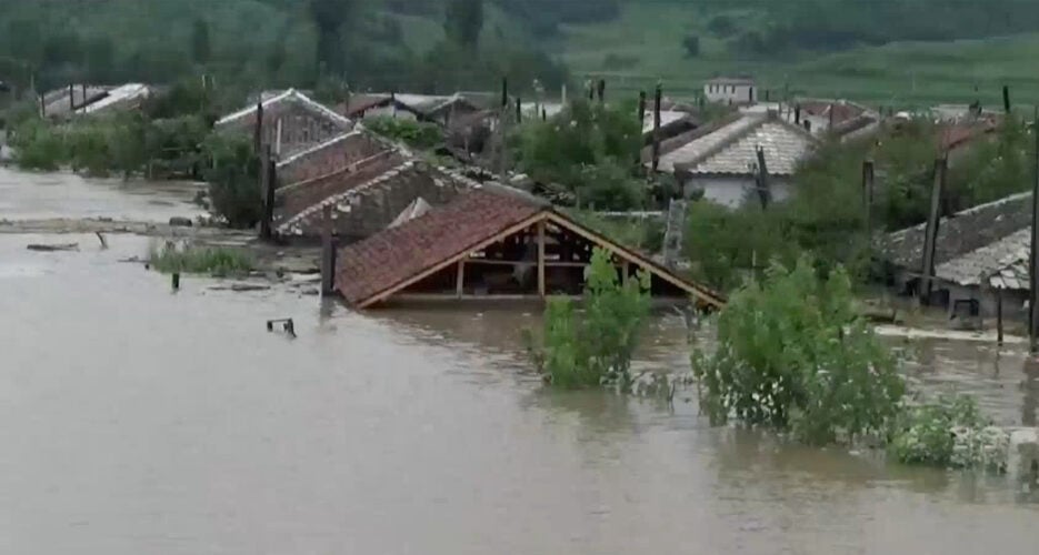 North Korean rocket launch site, villages flooded as state media silent