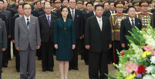 Kim Jong Un visits shrine with wife, meets military parade paratroopers