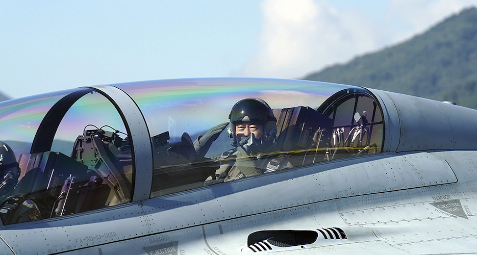 Need for speed? Moon rides fighter jet, promotes South Korea’s defense sector