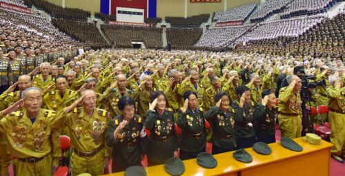 Elderly North Korean veterans pack stadium for conference despite COVID spread