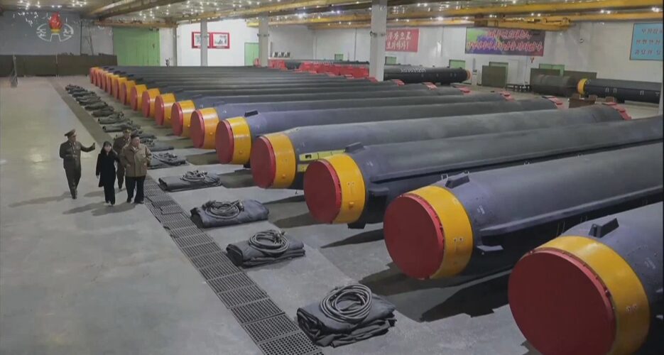 Kim Jong Un and daughter inspect mass-produced missiles at Pyongyang factory