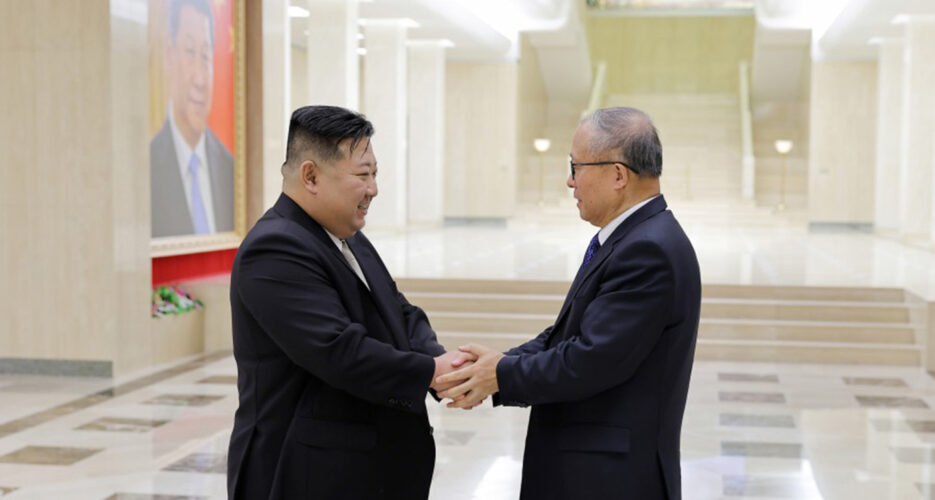 Kim meets with Chinese official after two cheer on nukes at military parade