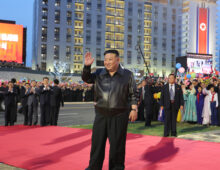 Kim Jong Un debuts new song praising himself at grand opening of housing project