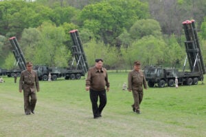Kim Jong Un leads salvo missile launch in first test of ‘nuclear trigger’ system