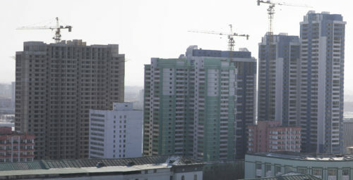 Towerblock construction surrounding Kim Il Sung square slows, photos show