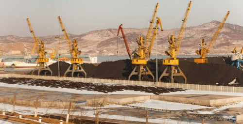 Vessels docking next to coal mountains at N. Korea’s Rajin harbor: pictures